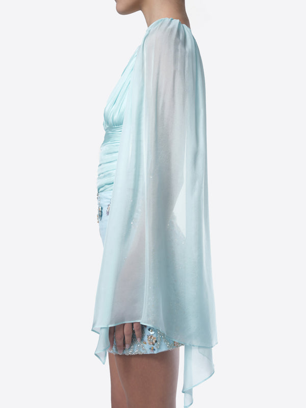 NHÏJE draped off shoulder top side view in aqua, hand-finished details, sophisticated design. Greek goddess 