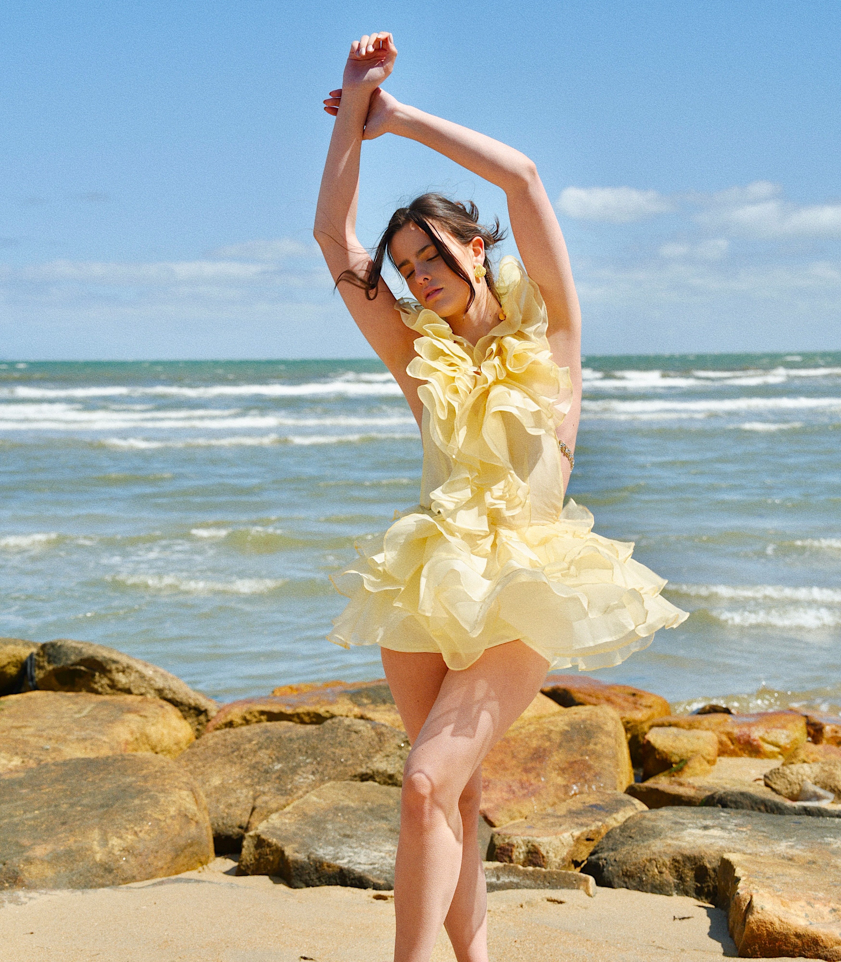 Discover the latest luxury ready‑to‑wear pieces from NHÏJE, premium craftsmanship, curated for timeless elegance. Shop new arrivals today.

Butter Yellow dress ruffles, mini dress, beach vibe, spring summer.