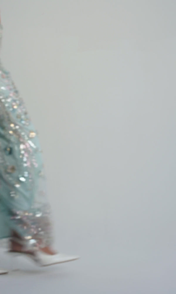 Aqua Bloom Sequin Midi Skirt silhouette in motion – fluid midi length and couture shimmer