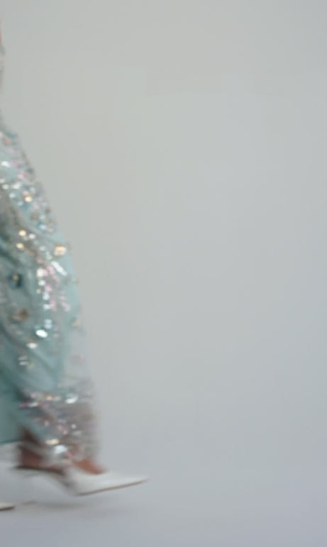 Aqua Bloom Sequin Midi Skirt silhouette in motion – fluid midi length and couture shimmer